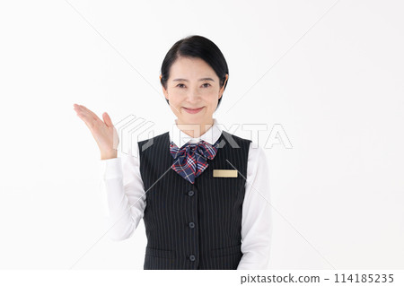 Middle-aged woman, uniform, hand-waving Middle-aged woman, uniform, hand-waving 114185235