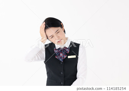 Middle-aged woman, uniform, headache Middle-aged woman, uniform, headache 114185254
