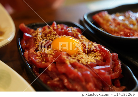 Beef tartare is a traditional Korean dish made by seasoning finely chopped beef without cooking it at all. Beef tartare is a traditional Korean dish made by seasoning finely chopped beef without cooking it at all. 114185269