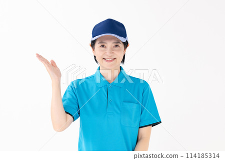 Middle-aged woman, uniform, waving her hands Middle-aged woman, uniform, waving her hands 114185314