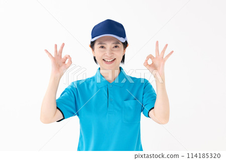 Middle-aged woman, uniform, OK Middle-aged woman, uniform, OK 114185320