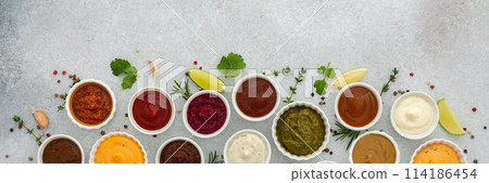 Different types of sauces in bowls 114186454