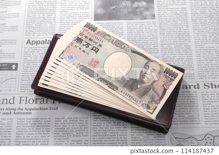 Banknotes and English newspapers Banknotes and English newspapers 114187437