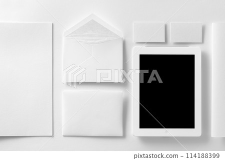 Branding identity mockup. Presentation folder, tablet, envelope, letterhead, business and invitation cards at white textured paper background. 114188399