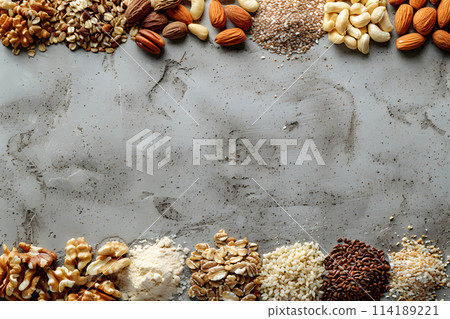 A variety of nuts and seeds, natural foods packed with nutrients, are elegantly arranged in a row on a wooden table, ready to be used as ingredients in a delicious cuisine dish or recipe 114189221