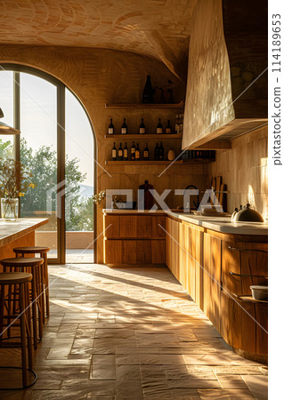 A kitchen with wooden cabinets and hardwood flooring is complemented by a large window, creating a warm and inviting interior design 114189653