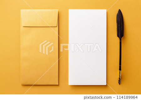 Mockup of envelope, blank white paper and vintage ink pen at golden paper background. 114189964