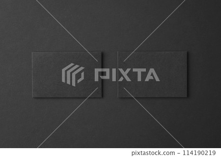 Mockup of two blank business cards at black textured background. Mockup of two blank business cards at black textured background. 114190219