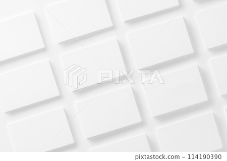 Mockup of horizontal business cards stacks arranged in rows at white textured paper background. Mockup of horizontal business cards stacks arranged in rows at white textured paper background. 114190390