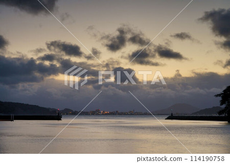 Fukuoka - Evening view of Imajuku and the silhouette of Mount Kaya 114190758