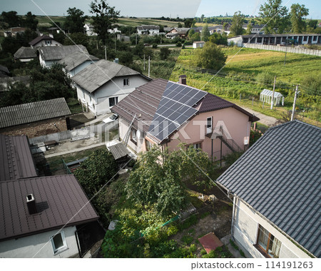 Collage of photos of installation and ready solar panels on the roof of house. Before and after concept. Modern technology and innovation. Idea of environment safety. Aerial view. Collage of photos of installation and ready solar panels on the roof of house. Before and after concept. Modern technology and innovation. Idea of environment safety. Aerial view. 114191263