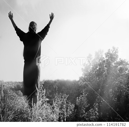 Happy girl pray to God Happy girl pray to God 114191782