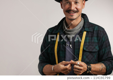 Closeup of confident happy man over studio white background Closeup of confident happy man over studio white background 114191799