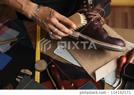 Care for leather shoes with polishing brush. Care for leather shoes with polishing brush. 114192571