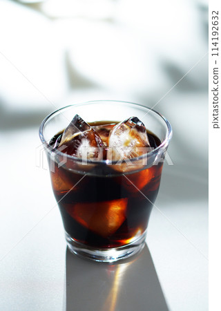 Sunlight filtering through the trees and iced coffee 114192632