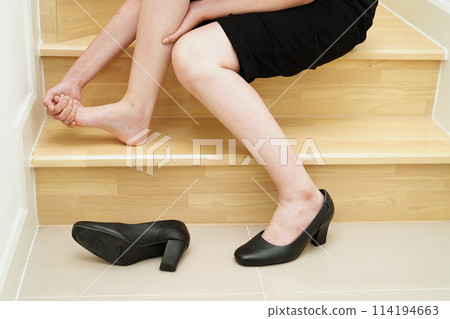 Asian lady woman injury from falling down on slippery surfaces stairs at home. Asian lady woman injury from falling down on slippery surfaces stairs at home. 114194663