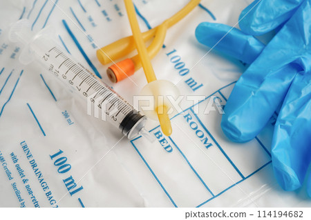 Foley catheter and urine drainage bag collect urine for disability or patient in hospital. 114194682