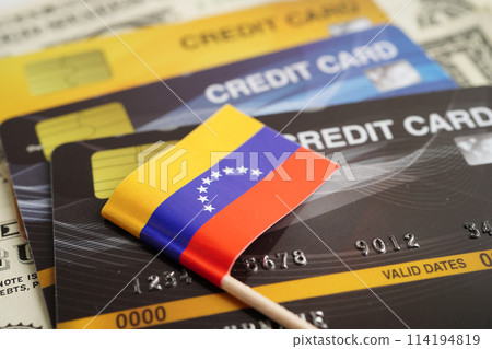 Venezuela flag on credit card, finance economy trading shopping online business. Venezuela flag on credit card, finance economy trading shopping online business. 114194819