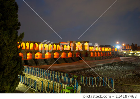 Twilight light on Khaju Bridge, Isfahan, Iran. 114197468