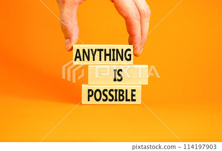 Anything is possible symbol. Concept words Anything is possible on beautiful wooden blocks. Beautiful orange table orange background. Businessman hand. Business anything possible concept. Copy space. Anything is possible symbol. Concept words Anything is possible on beautiful wooden blocks. Beautiful orange table orange background. Businessman hand. Business anything possible concept. Copy space. 114197903