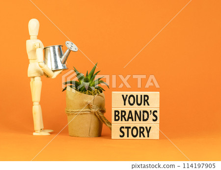 Branding and your brand story symbol. Concept words Your brands story on beautiful wooden blocks. Beautiful orange background. Businessman icon. Business branding your brand story concept. Copy space. 114197905