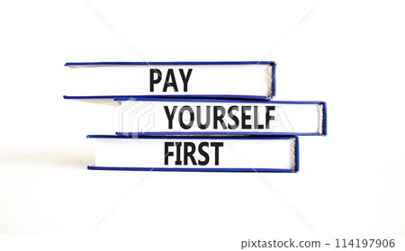 Pay yourself first symbol. Concept words Pay yourself first on beautiful books. Beautiful white table white background. Business and pay yourself first concept. Copy space. 114197906