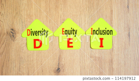 DEI diversity equity and inclusion symbol. Concept words DEI diversity equity inclusion on beautiful paper. Beautiful wooden background. Business DEI diversity equity and inclusion concept. Copy space 114197912