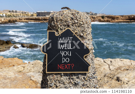 What will you do next symbol. Concept words What will you do next on beautiful blackboard. Beautiful stone sea background. Business, what will you do next concept. Copy space. 114198110