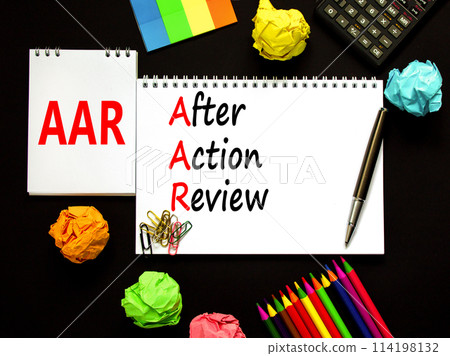 AAR After action review symbol. Concept words AAR After action review on beautiful white note. Beautiful black background. Black calculator. Business AAR after action review concept. Copy space. 114198132
