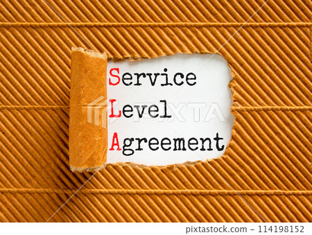 SLA service level agreement symbol. Concept words SLA service level agreement on beautiful white paper. Beautiful brown paper background. Business SLA service level agreement concept. Copy space. 114198152
