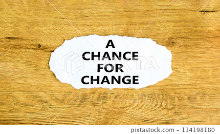A chance for change symbol. Concept words A chance for change on beautiful white paper. Beautiful wooden background. Business A chance for change concept. Copy space. A chance for change symbol. Concept words A chance for change on beautiful white paper. Beautiful wooden background. Business A chance for change concept. Copy space. 114198180