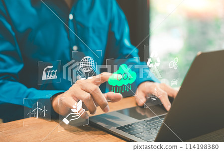 Sustainable Development and Carbon Footprint Analysis Concept. Carbon Neutrality, A man using a laptop with icons representing sustainability, CO2 emissions, and environmental management strategies. 114198380