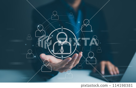 HR, Human Resources Targeting Concept in Business. Businessman use a virtual interface to target a human resource symbol, symbolizing recruitment and team management. Employment headhunting, HRM CRM, 114198381
