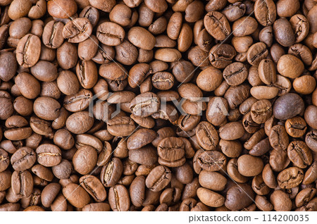 Roasted coffee as a background. Coffee beans. 114200035