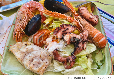 Seafood platter with musselspus, squid, squidpus and French fries a Marsaxlokk cafe, Malta 114200262