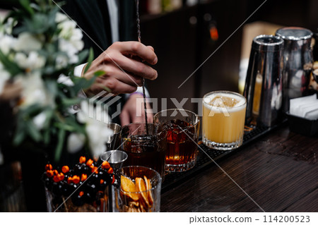 Mixing alcohol with ice. 114200523