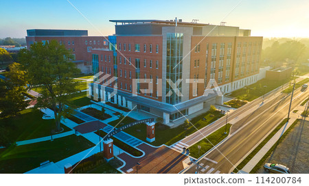 Ball State University arch over sidewalk with sunny sunrise, Muncie Indiana Ball State University arch over sidewalk with sunny sunrise, Muncie Indiana 114200784