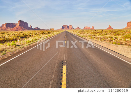 Desert Highway to Monument Valley, Clear Sky, Road Perspective Desert Highway to Monument Valley, Clear Sky, Road Perspective 114200919