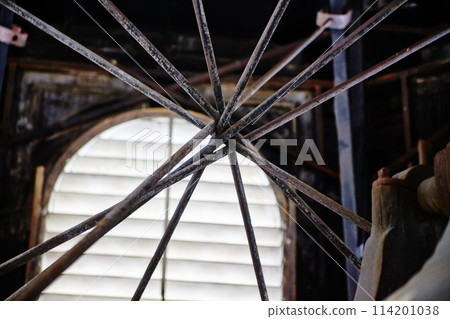 Rusted Geometric Metalwork with Staircase Background in Abandoned Warehouse 114201038