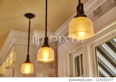 Elegant Pendant Lights in Modern Interior, Warm Glow Atmosphere 114201077