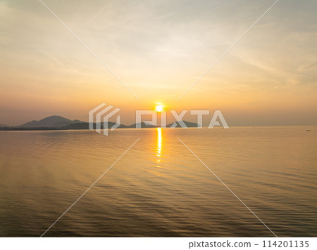 Aerial view sunset sky,Nature beautiful Light Sunset or sunrise over sea,Colorful dramatic majestic scenery sunset Sky with Amazing clouds and waves in sunset sky nature light cloud background Aerial view sunset sky,Nature beautiful Light Sunset or sunrise over sea,Colorful dramatic majestic scenery sunset Sky with Amazing clouds and waves in sunset sky nature light cloud background 114201135