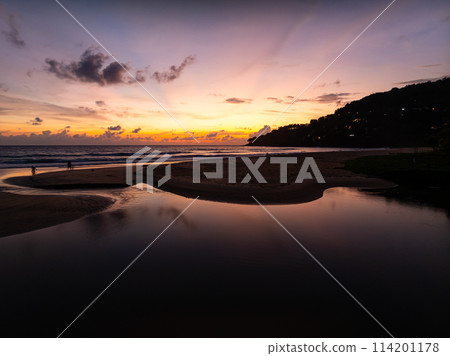 Aerial view sunset sky,Nature beautiful Light Sunset or sunrise over sea,Colorful dramatic majestic scenery sunset Sky with Amazing clouds and waves in sunset sky nature light cloud background 114201178