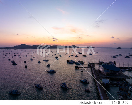 Aerial view sunset sky,Nature beautiful Light Sunset or sunrise over sea,Colorful dramatic majestic scenery sunset Sky with Amazing clouds and waves in sunset sky nature light cloud background 114201202