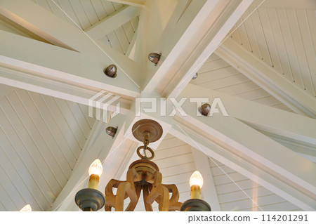 Modern Ceiling with Rustic Chandelier, Architectural Elegance Upward View Modern Ceiling with Rustic Chandelier, Architectural Elegance Upward View 114201291