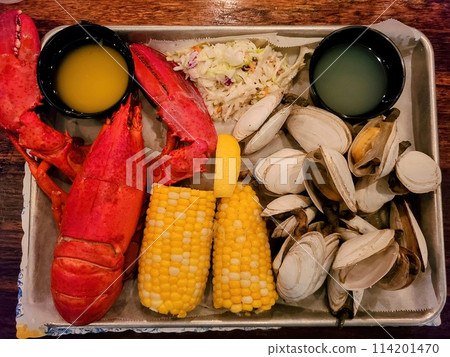 Rustic Seafood Feast with Lobster and Clams, Overhead View 114201470
