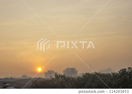 sunset over the city sunset over the city 114201653