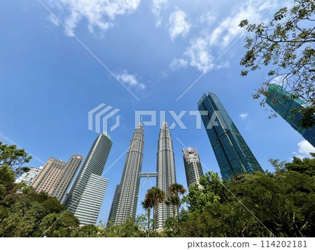 Skyscrapers and Petronas Twin Towers seen from KLCC Park Skyscrapers and Petronas Twin Towers seen from KLCC Park 114202181