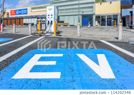 Kariya Highway Oasis Parking lot with EV charging equipment 114202546