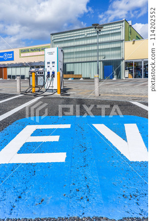 Kariya Highway Oasis Parking lot with EV charging equipment 114202552