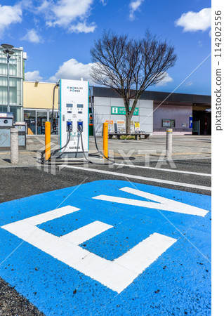 Kariya Highway Oasis Parking lot with EV charging equipment 114202556
